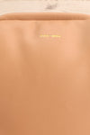 Bubbly Sand Faux-Leather Crossbody Clutch | La petite garçonne logo close-up