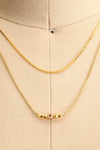 Camilia Sukh Golden Double Chain Pendant Necklace on mannequin close-up | Boutique 1861