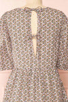 Cesana Black Puffy Sleeve Floral Print Dress | Boutique 1861 back close-up