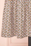 Cesana Black Puffy Sleeve Floral Print Dress | Boutique 1861 bottom