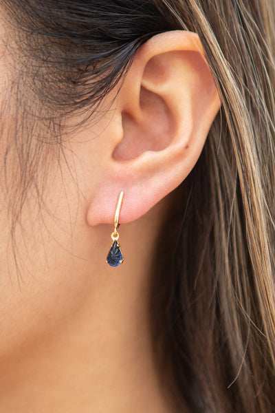 Charline Lapis Blue Golden Pendant Earrings | Boutique 1861 on model