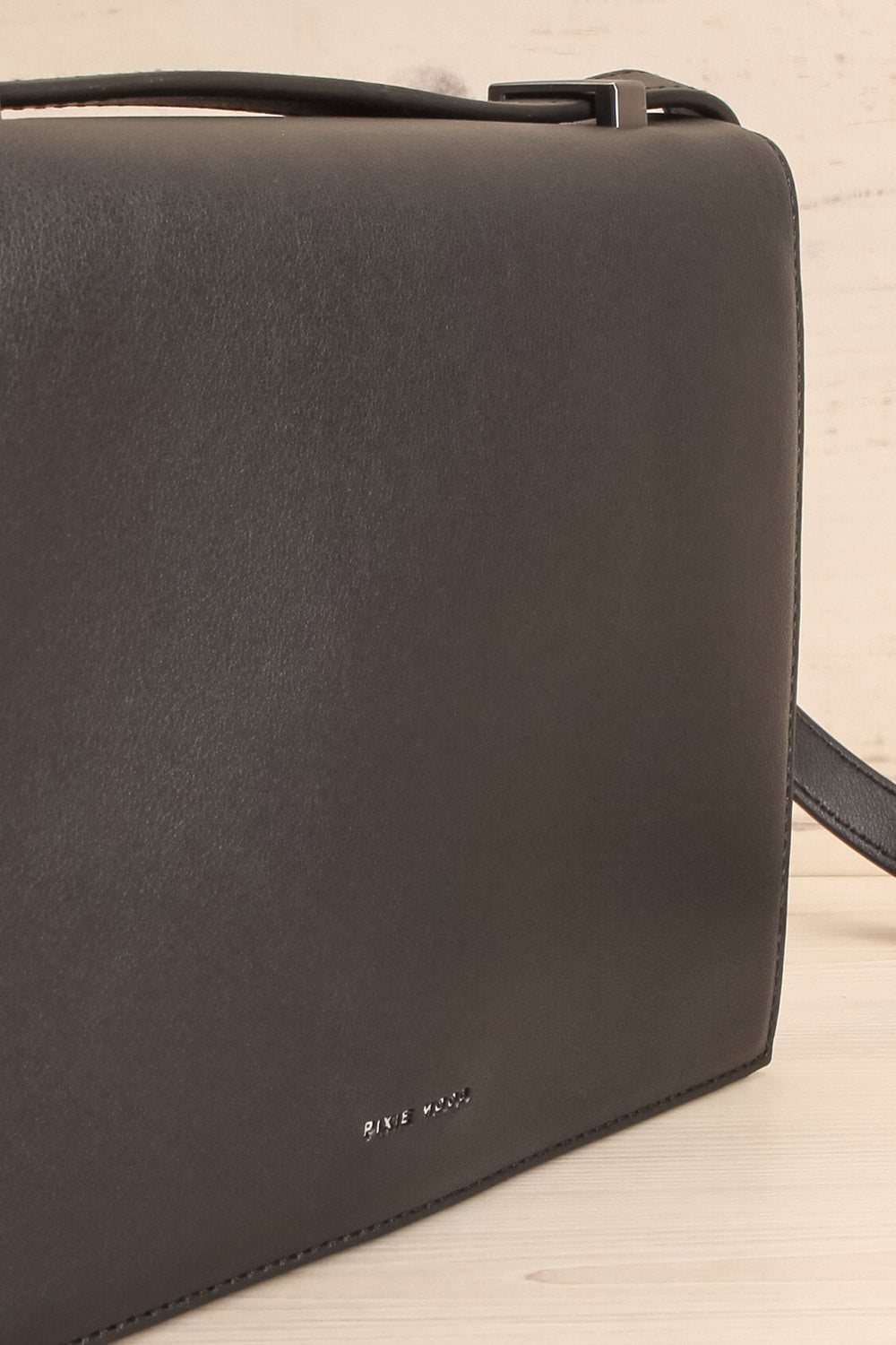Charlot Black Faux-Leather Pixie Mood Handbag side close-up | La Petite Garçonne