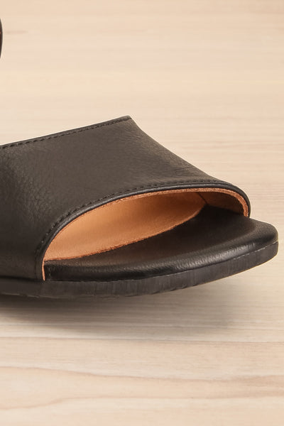 Chiesa Black Asymmetrical Leather Sandals | La petite garçonne front close-up