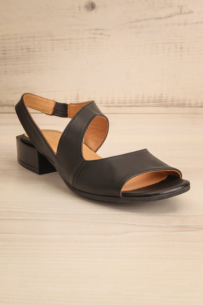 Chiesa Black Asymmetrical Leather Sandals | La petite garçonne front view