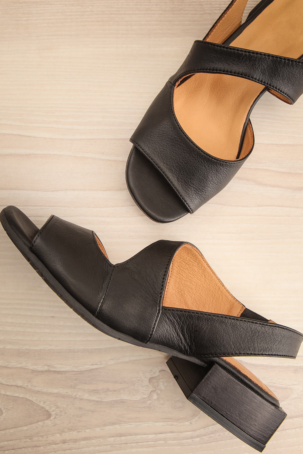 Chiesa Black Asymmetrical Leather Sandals | La petite garçonne flat view