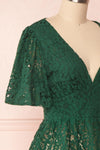 Claatje Green Lace Peplum Top with Plunging Neckline | Boutique 1861 side close-up