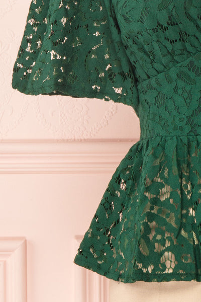 Claatje Green Lace Peplum Top with Plunging Neckline | Boutique 1861 bottom close-up