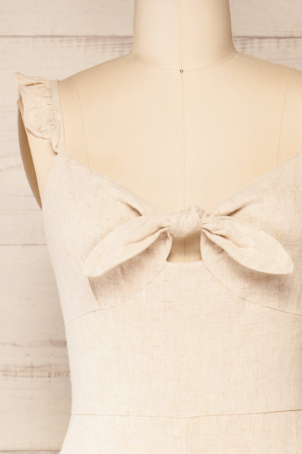 Crocevie Beige Jumpsuit with V-Neckline | La petite garçonne front close-up