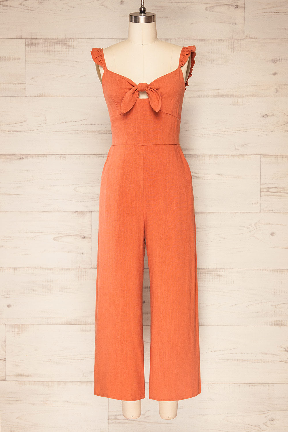 Crocevie Orange Jumpsuit with V-neckline | La petite garçonne front view