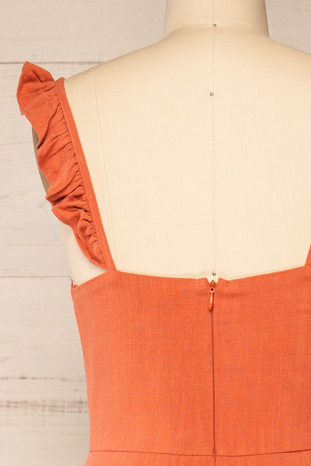 Crocevie Orange Jumpsuit with V-neckline | La petite garçonne back close-up