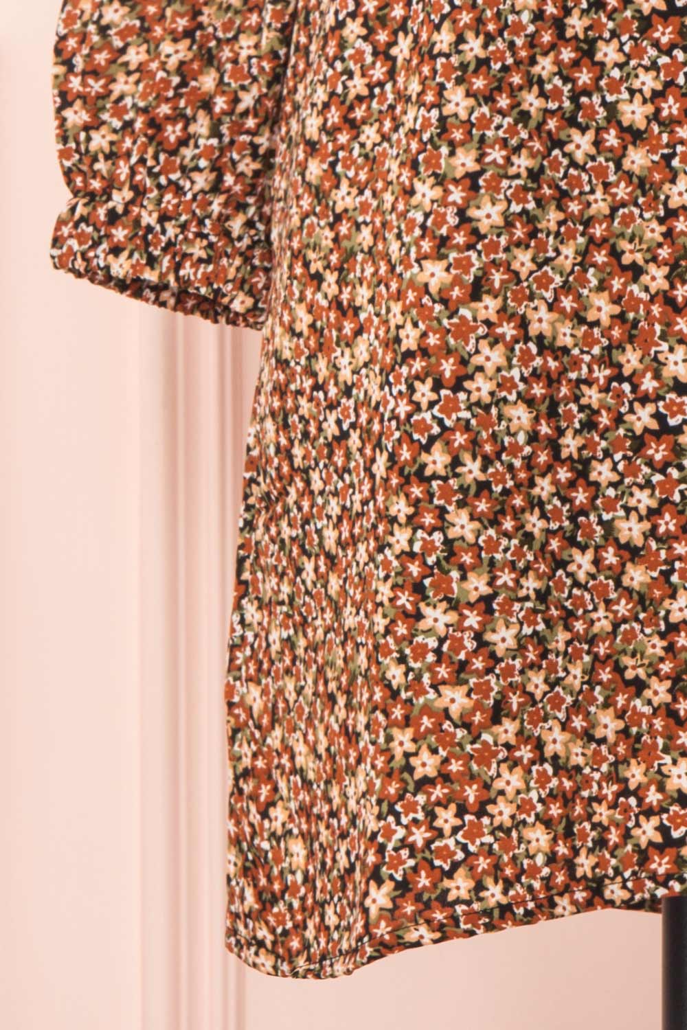 Danette Floral Pattern Long Sleeved Shift Dress | Boutique 1861 bottom close-up 