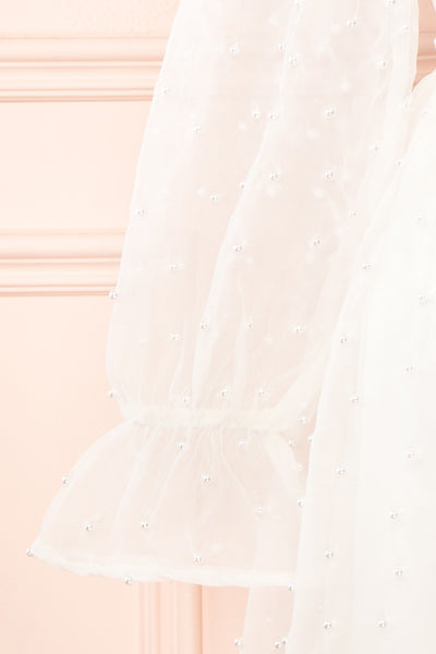 Darlene Short White A-Line Dress w/ Pearls | Boutique 1861 sleeve close-up
