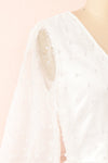 Darlene Short White A-Line Dress w/ Pearls | Boutique 1861 side close-up