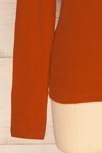 Didima Cinnamon Orange Ribbed Top with Stand Collar | La Petite Garçonne bottom close-up