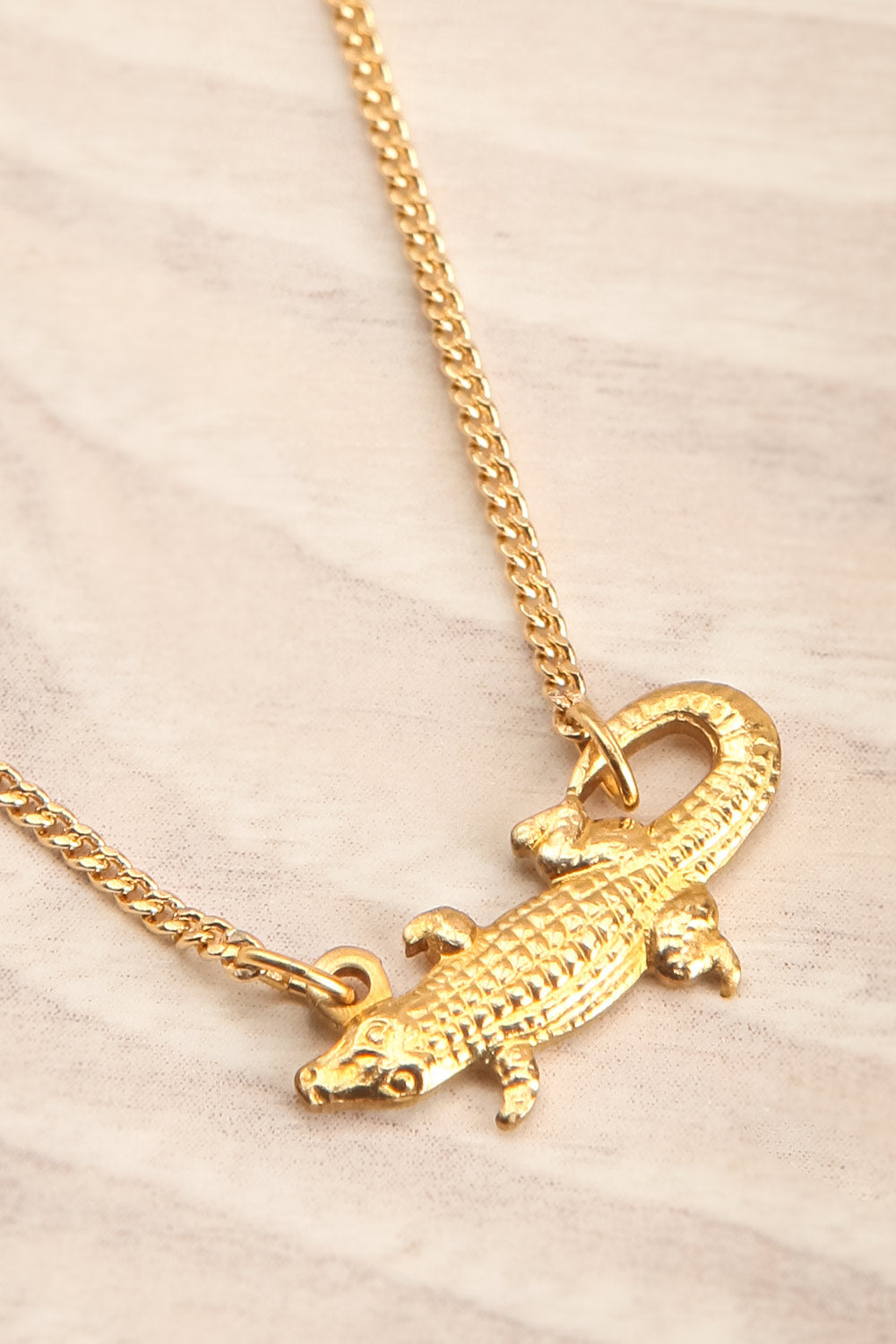 Docia Srey Golden Crocodile Pendant Necklace close-up | La Petite Garçonne