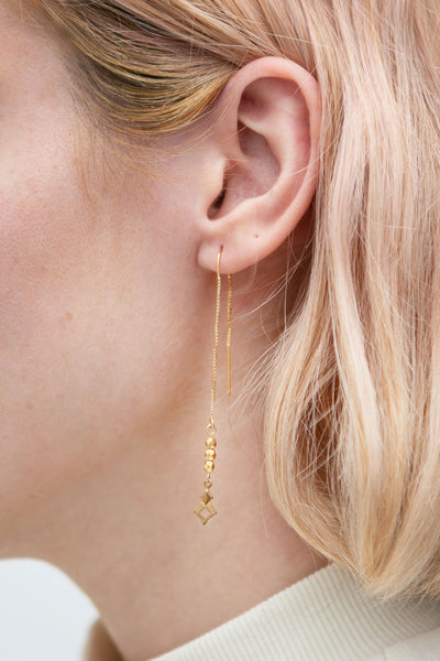 Doris Day Gold Chain & Charm Pendant Earrings | La Petite Garçonne model