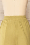 Dunedin Green High-Waisted Textured Shorts | La petite garçonne back close-up