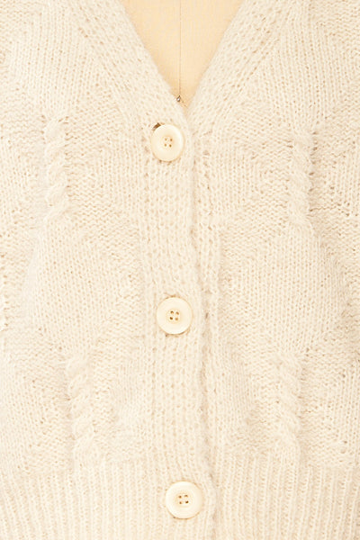 Eggje Ivory Button-Up Knit Cardigan | La petite garçonne fabric