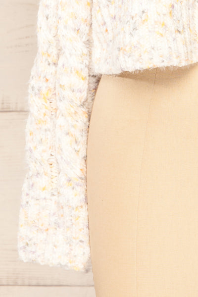 Emersin Ivory Cropped Knit Sweater | La petite garçonne bottom close-up