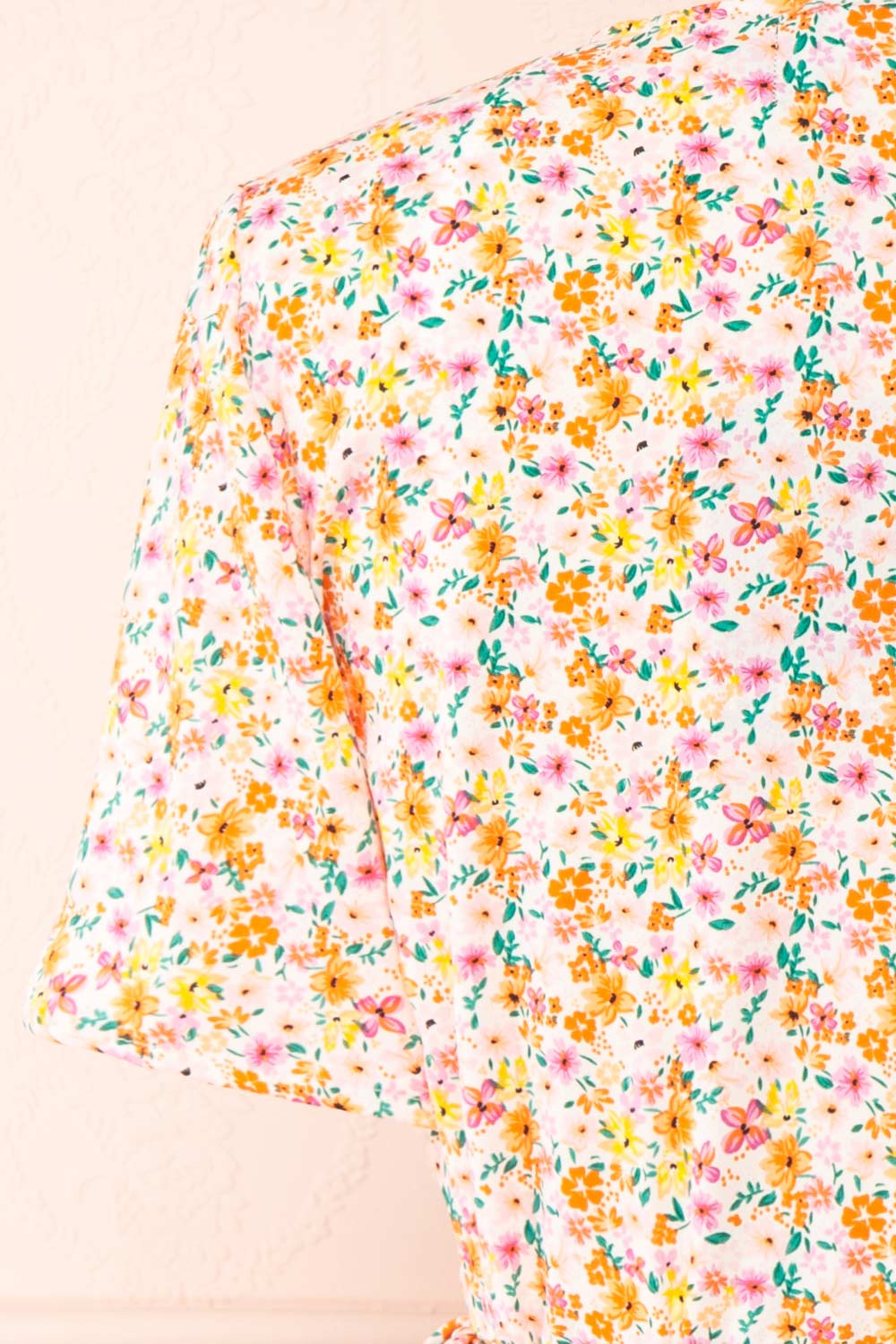 Esrin Orange Short Floral Wrap Dress | Boutique 1861 back close-up