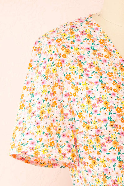 Esrin Orange Short Floral Wrap Dress | Boutique 1861 side close-up