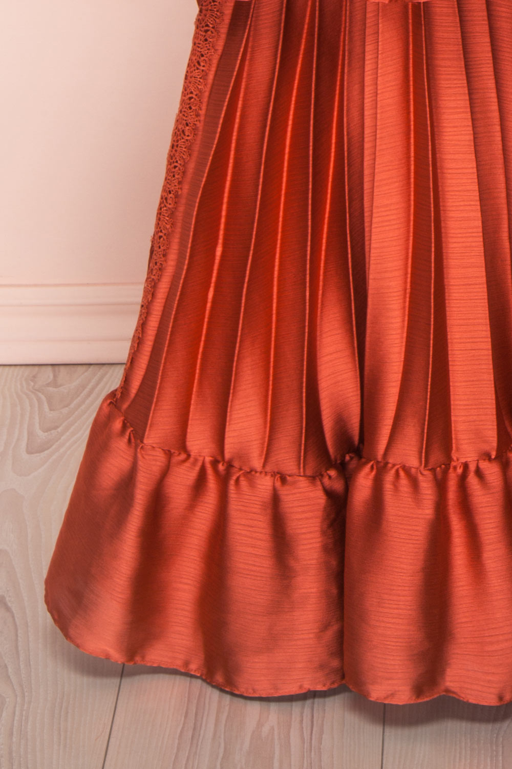 Euridice Burnt Orange Pleated Maxi Dress | Boutique 1861 bottom close-up