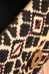 Forro - Black and beige embroidered clutch bag