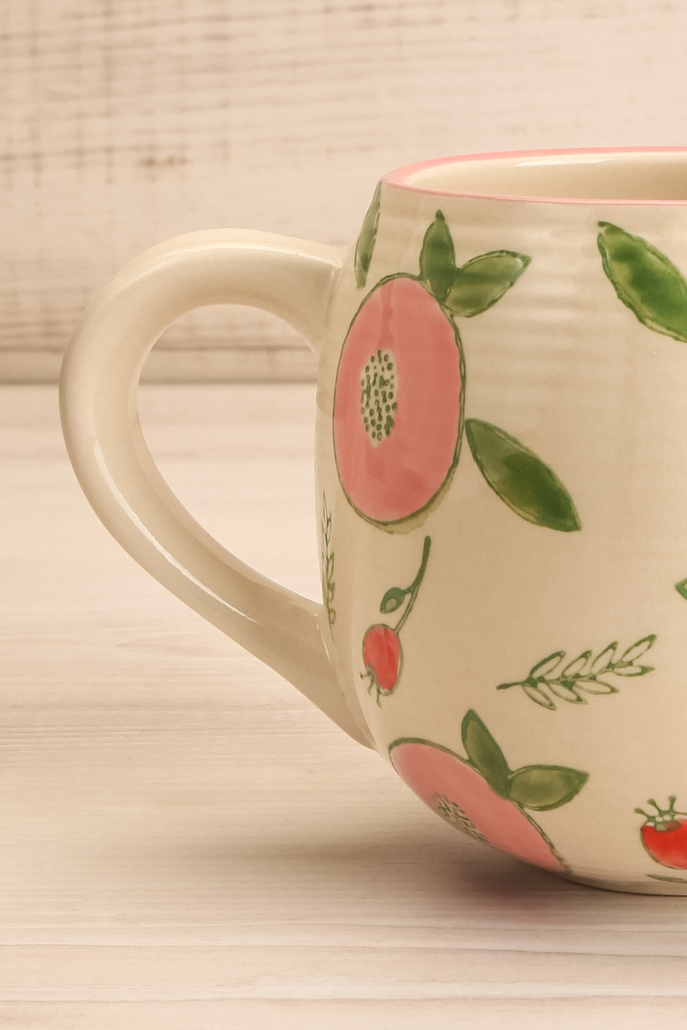 Frappé Beige Mug with Fruits and Leaves | La petite garçonne handle close-up