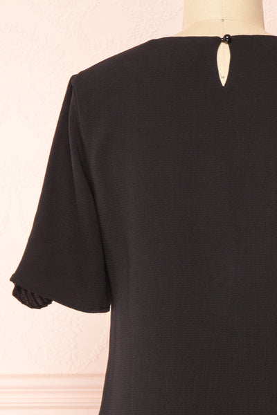 Ganymedes Black Pleated Frills Short Dress | Boutique 1861 back close-up