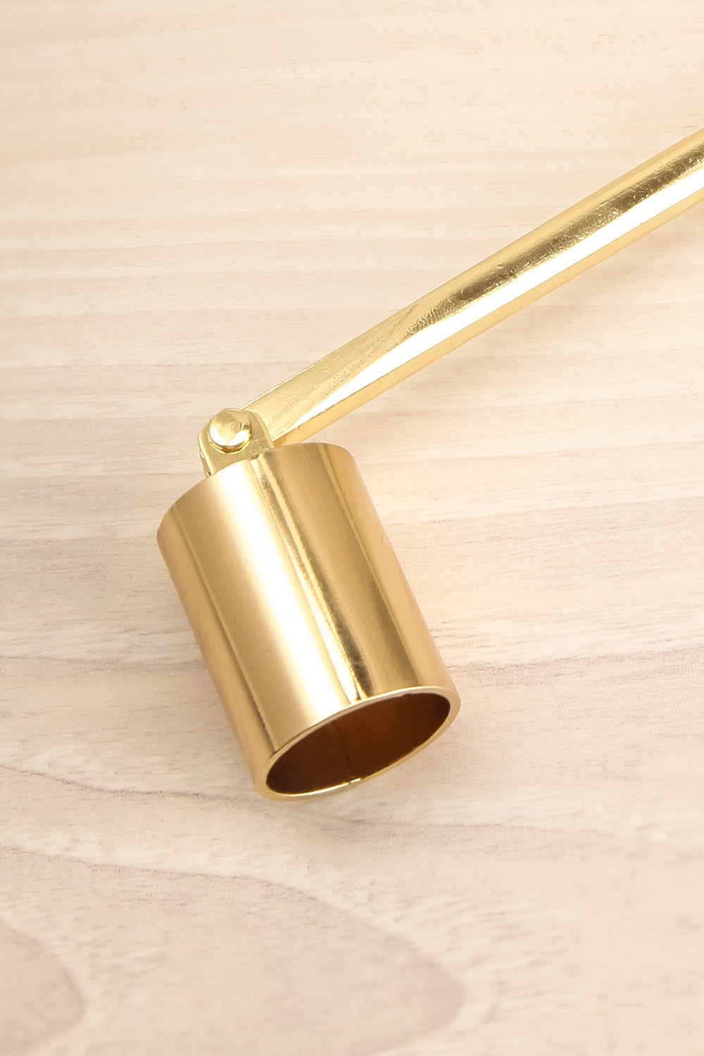 Gold Candle Wick Snuffer | Maison garçonne close-up