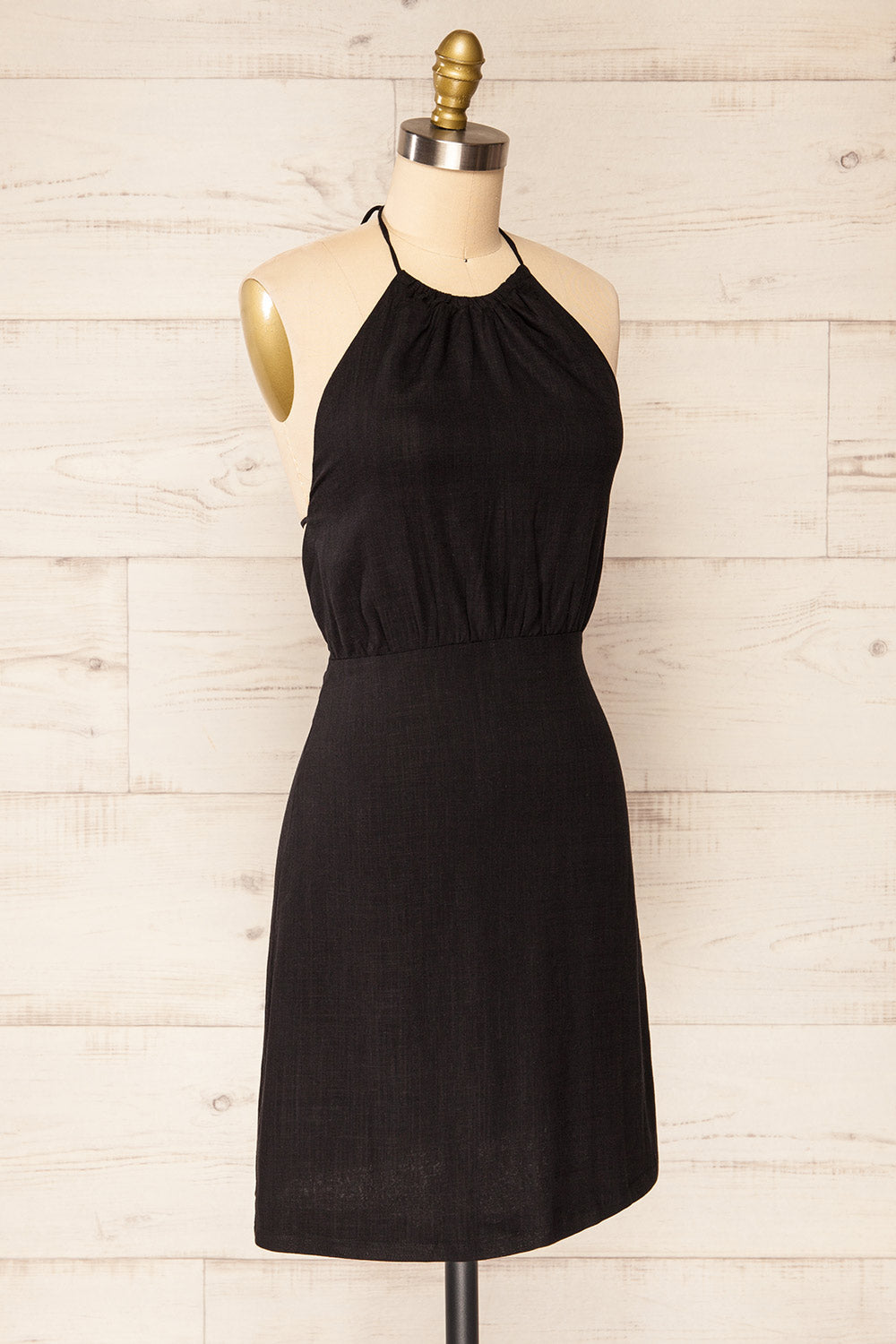 Gomati Black Backless Short Halter Dress | La petite garçonne side view