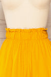 Gysele Mustard High-Waisted Paperbag Shorts | La petite garçonne front close-up