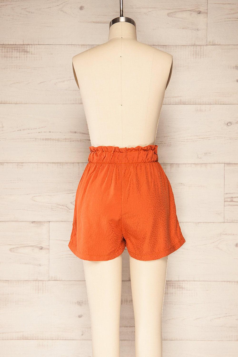 Gysele Orange High-Waisted Shorts with Pockets | La petite garçonne back view 