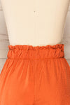 Gysele Orange High-Waisted Shorts with Pockets | La petite garçonne back close-up