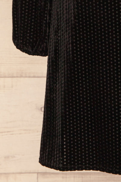 Herleen Noir Black Pattern Velvet Wrap Dress | La Petite Garçonne bottom close-up