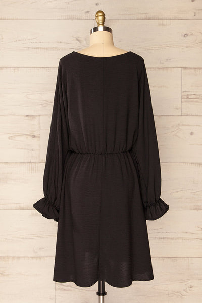 Hermanas Black Short A-line Dress w/ Long Sleeves | La petite garçonne back view