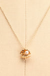 Hesperie Golden Sea Shell Pendant Necklace close-up | Boutique 1861