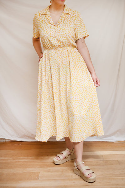 Hilda Yellow Short Sleeve Floral Maxi Dress | Boutique 1861 model