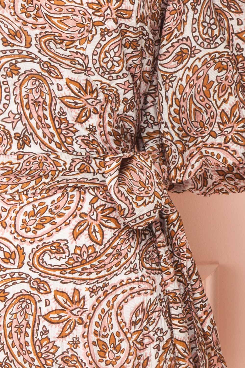 Hinata Paisley Short Wrap Dress | Boutique 1861 bow close-up