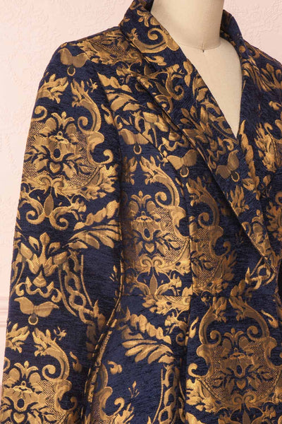 Hyleoroi Navy & Gold Jacquard Pleated Princess Coat | Boutique 1861 side close-up