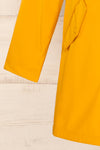 Icewind Yellow Button Up Raincoat w/ Sherpa Interior | La petite garçonne sleeve