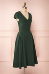 Iktomi Green A-Line Midi Dress w/ V Neck side view | Boutique 1861