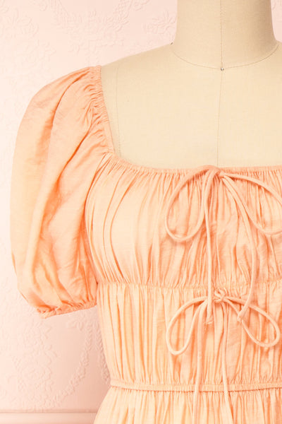 Imna Peach A-Line Midi Dress w/ Puffy Sleeves | Boutique 1861 front close-up