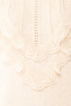 Ingrid Beige Knit Sweater w/ Ruffled Lace| Boutique 1861 fabric