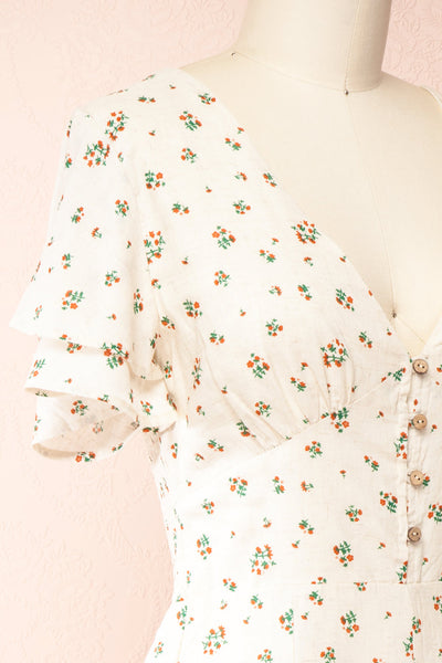 Irmelin Short Sleeve Floral Romper | Boutique 1861 side close-up