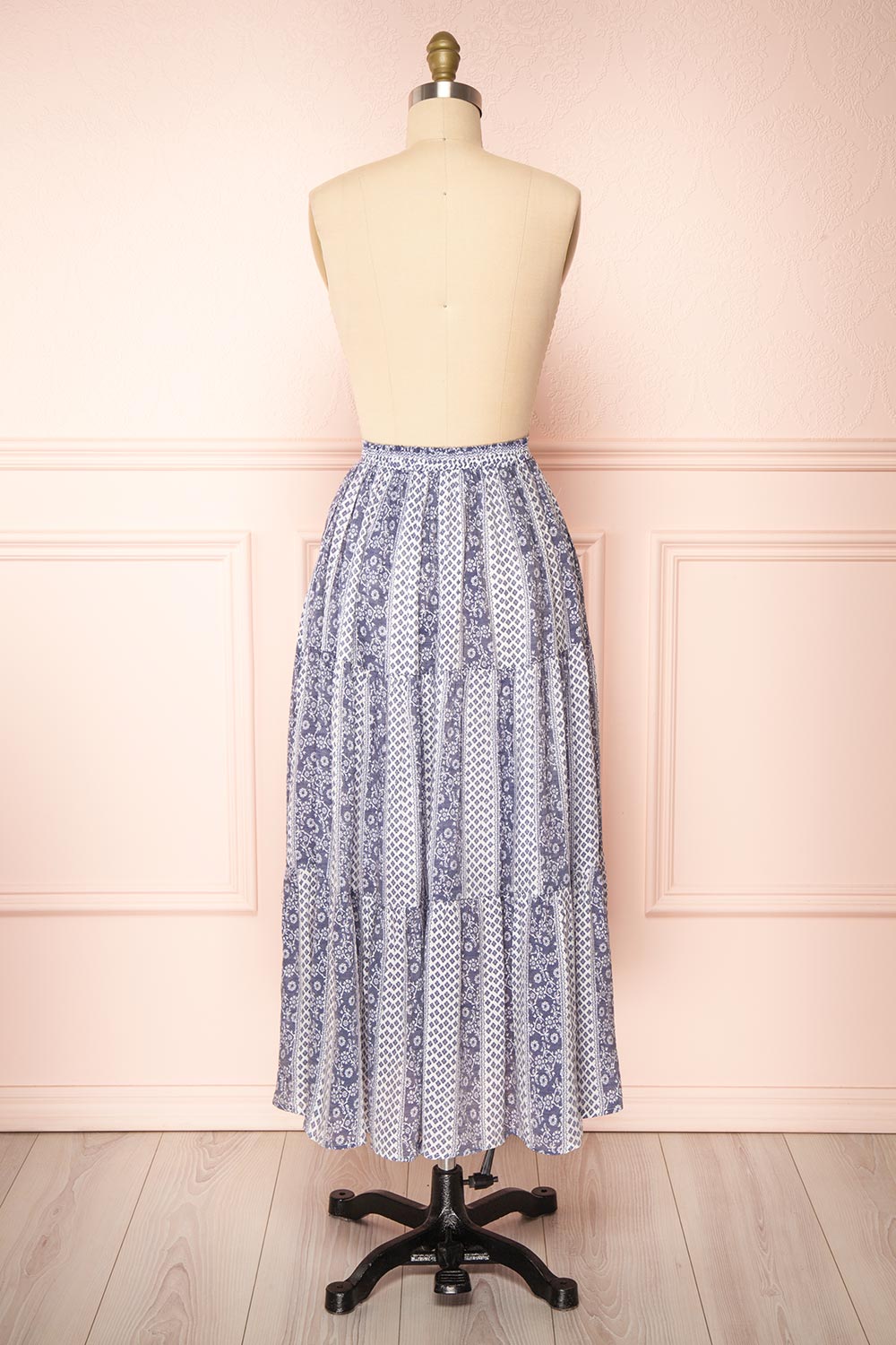 Irmette Blue Patterned Tiered Midi Skirt | Boutique 1861 back view 