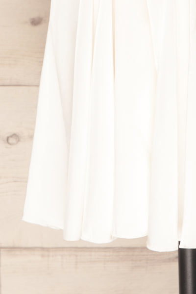 Isobel White Short Satin Dress with 3/4 Sleeves | La petite garçonne bottom