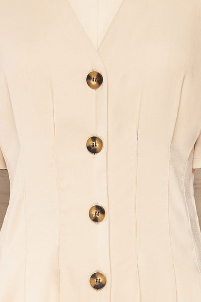 Izola Beige Pleated Button-Up Romper | La petite garçonne details