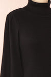 Janick Black Ribbed Turtleneck Fitted Dress | Boutique 1861 side close-up