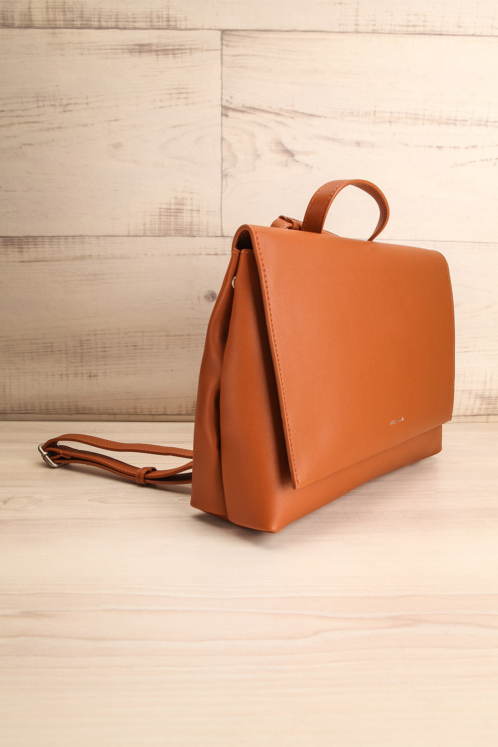 Janik Cognac Pixie Mood Faux-Leather Backpack side view | La Petite Garçonne